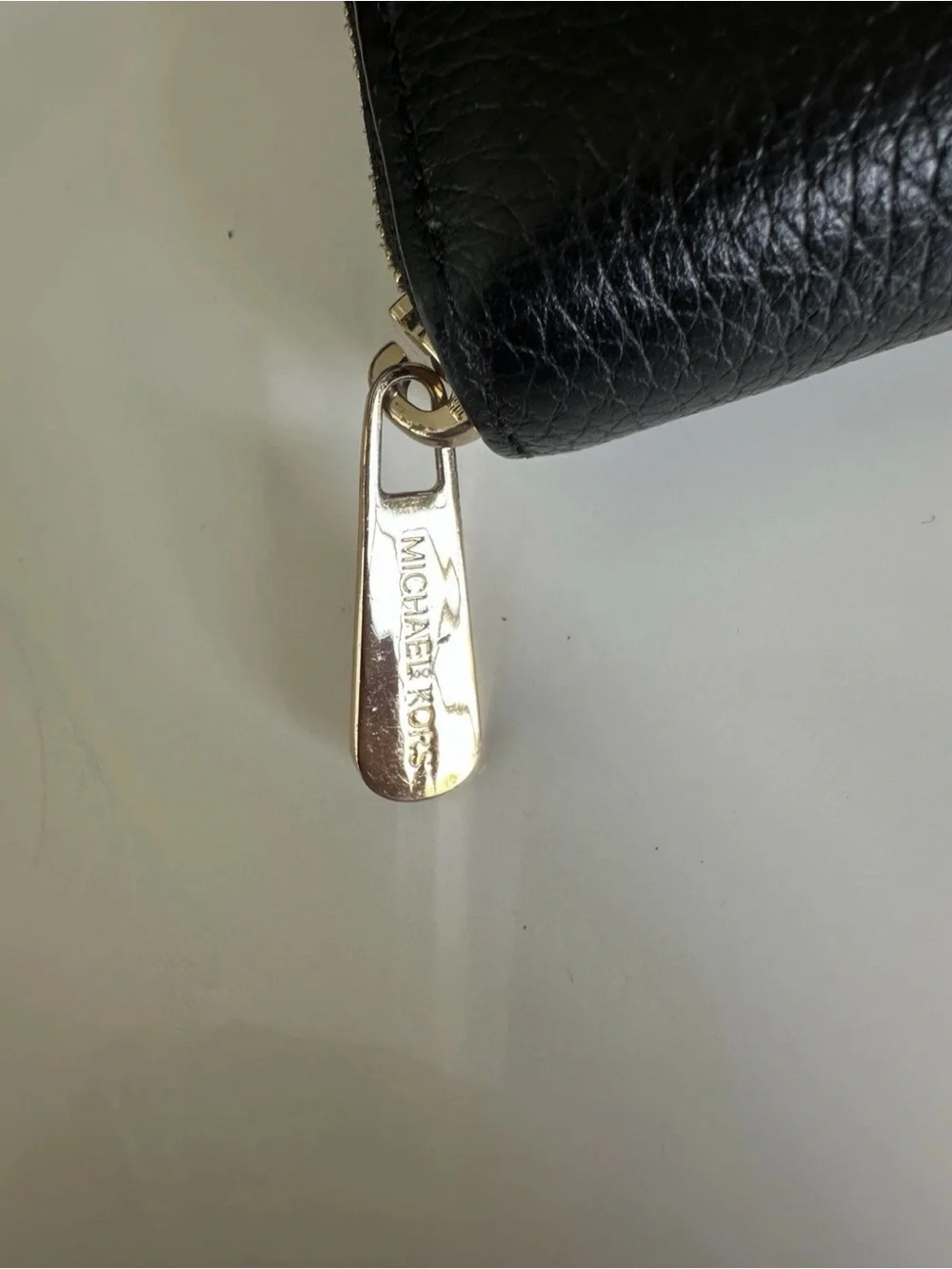 Michael Kors Black Pebbled Leather Zip Wallet with Gold Tone Zipper Pull